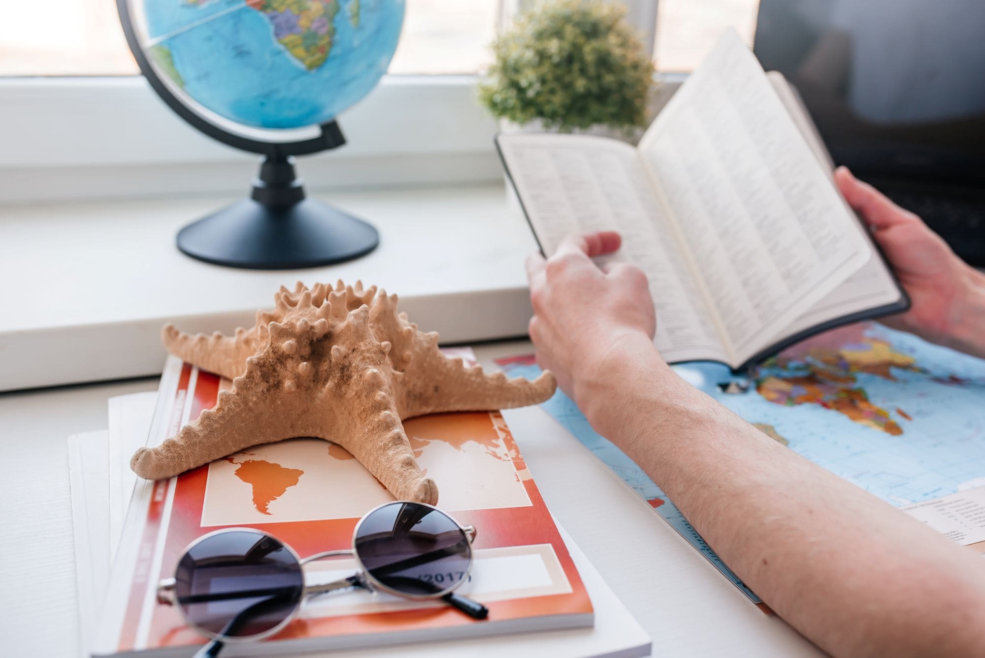 a person planning a beach vacation